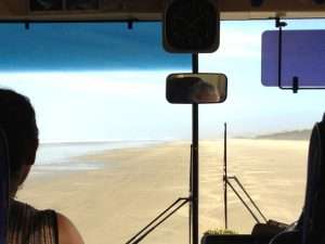 Driving on 90 Mile Beach--the whole way! The beach is classed as a main road.